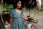 A gift of Patarashca (freshly caught fish wrapped in banana leaves) offered by a Kandoshi woman after we stopped on the banks of the river to give her son a ride to the nearest village. The Kandoshi live downriver from the Achuar on the Huitoyaco and Pastaza Rivers.