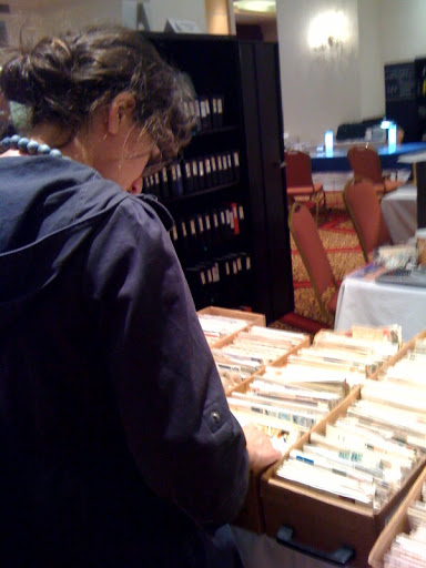 here is Corinne looking through boxes of envelopes - each envelope boasts original stamps from the original date of issue. here is Corinne looking through boxes of envelopes - each envelope boasts original stamps from the original date of issue.
