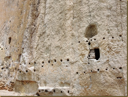 If you look closely, you can see the outlines of petroglyphs on the wall. The horizontal rows of hole reveal where there were once roofs from the extended stone structures they added to the outside of the caves.