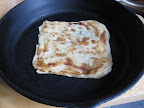 Reheated in a dry cast-iron skillet, the chewy, flexible m'smen become a great base for open-faced sandwiches. Or just slather them with some soft butter and sprinkle with salt.