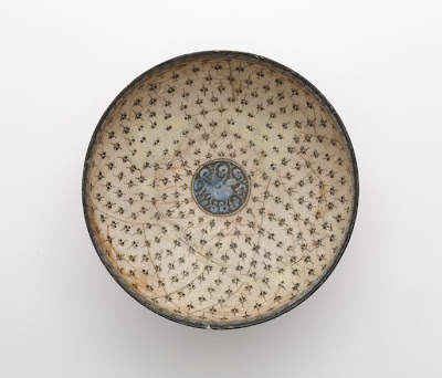 Bowl | Origin:  Iran | Period: 13th century  Saljuq period | Details:  Not Available | Type: Stone-paste with underglaze decoration | Size: H: 10.4  W: 19.5  cm | Museum Code: F1910.9 | Photograph and description taken from Freer and the Sackler (Smithsonian) Museums.