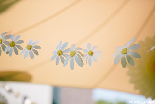 I made this garland from paper daisies (in the sale) and used yellow tissue paper for the center and threaded on monofilament. 

Photograph by Allan Zepeda (allanzepeda.com) for Elan Artists (elanartists.com)