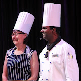 Sue With Her Chef Teammate Awaiting Their Chance To Cook - Celebrity Summit