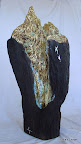169 - Le Puits d'Or - 2007<br />
H 72 cm - Poids 8 Kg<br />
Sculpture bois, feuille d'or, de cuivre et acrylique iridescente