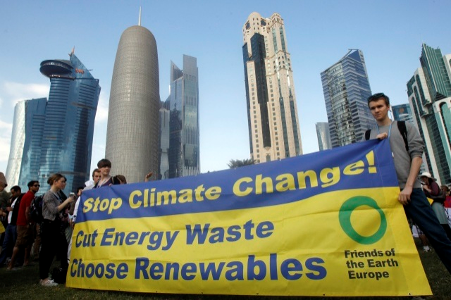 Friends of the Earth Europe activists demand action to address climate change in Doha, Qatar. Engineering and Technology Magazine