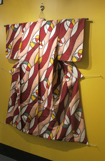 A kimono that is beautiful enough to hang as art. I love the textile pattern.