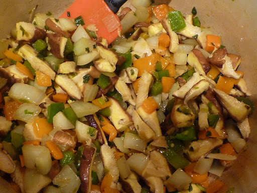 Stir in the mushrooms and cook a couple of minutes.