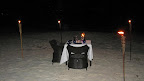 One a calm evening we enjoyed a romantic dinner in the sand.