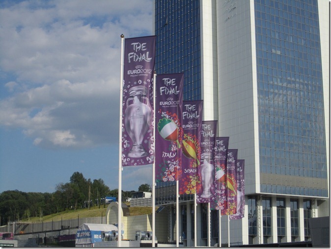 Row of flags in front of the stadium