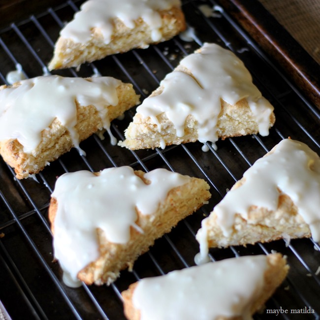 These yummy Coconut Lime White Chocolate Scones are filled with buttery toasted coconut and white chocolate chips and topped with a white chocolate and lime glaze! // www.maybematilda.com