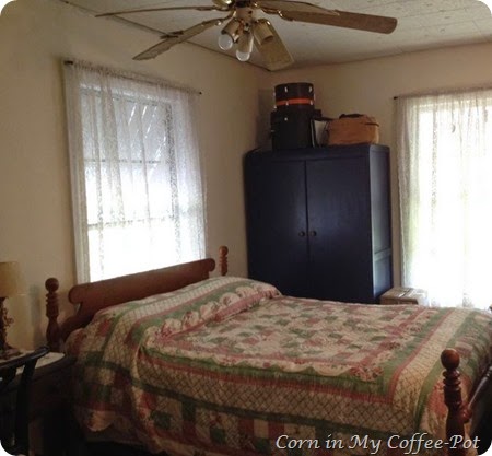 midnight blue armoire guest bedroom