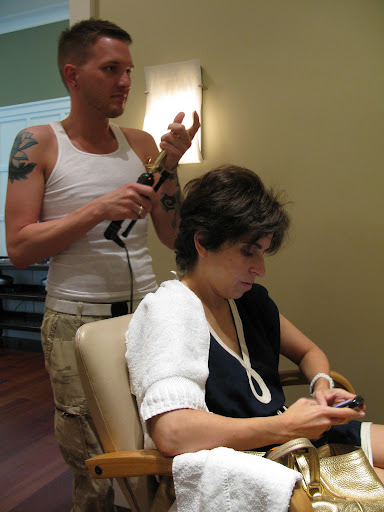 Our hair stylist Jerami and me (multitasking in the chair) prep for my editor's letter portrait.
