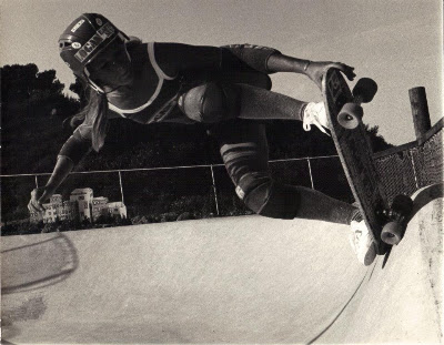 Robin grabbing the board at our local skatepark........