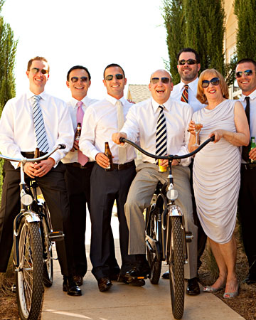 These groomsmen sporting different brightly patterned ties mounted bicycles for a portrait with the groom and his mother. These groomsmen sporting different brightly patterned ties mounted bicycles for a portrait with the groom and his mother.