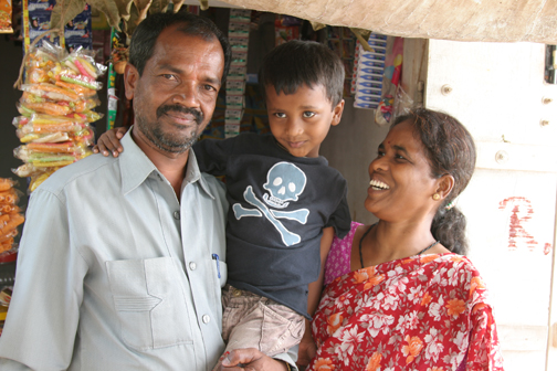 Jayashree and Ramo with Hoysala in front of the shop.