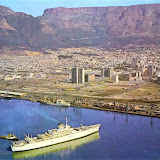 Cape Town Foreshore with SA Vaal docking after voyage from Southampton . 

Sanlam building centre stage, then tallest in Cape Town, beating both the Old Mutual Building and General Post Office.