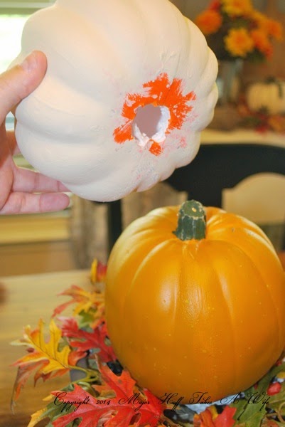 Stacking pumpkins for topiary.jpg Stacking pumpkins for topiary