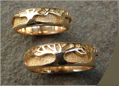 ... unique finger size.The Tree of Life his and hers matching wedding ring