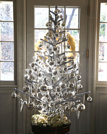I love that Martha collects and decorates her vintage trees.  This silver tree sits in her entrance at Bedford.(marthastewart.com)