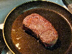 I tried one of Emeril's New York strip steaks. With a steak as well-marbled as this one, I decided to take advantage of the juiciness! first I pan seared the steak, then transferred it to a baking dish and finished it in the oven...