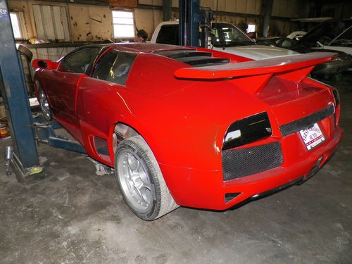[Lamborghini-Murcielago-Toyota-MR2-8%255B2%255D.jpg]