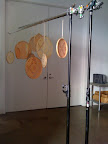 These are all of our fabric-filled embroidery hoops hanging off to the side while we shoot another table. These are all of our fabric-filled embroidery hoops hanging off to the side while we shoot another table.