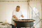 Dinner began with grilled salmon in red curry with fennel-apple salad and celery root puree, while entrees served family-style included dishes like Icelandic lamb grilled on an oversized pan and salt cod croquettes with romesco sauce.