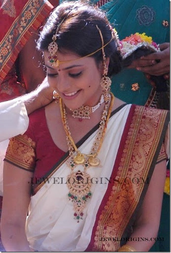 South Indian actress Nisha Agarwal with designer bridal necklace and 