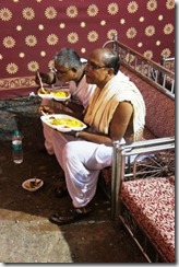 The priests eat after doing their thing              