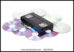 stock-photo-cd-vs-vhs-vhs-cassette-lay-on-the-many-cd-disks-98230553 stock-photo-cd-vs-vhs-vhs-cassette-lay-on-the-many-cd-disks-98230553