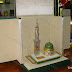 Proudly we produced this piece of art for the Institution of Al-Medina Al-Munawwra Award, which is a prestigious award in the Arab world granted to a winner chosen by an elite committee in different fields of studies. The award is a custom made model of Al Medina Mosque. Diecast from brass, it is composed of 75 pieces assembled together to make a fantastic royal award, featuring a 24K gold plated dome and accessories in addition to silver plated parts.  The award s mounted on a marble plate and personalized with a gold plated plate. It is presented in a luxury box. View the close up photos to examine the fine details and the craftsmanship level required to produce such a masterpiece. If you have special requirements, we will be glad to produce that for you. This product is not for sale, it is showcased here to give you an idea of what we can produce for you. جائزة المدينة المنورة