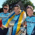 Rhys Pollock with Maarten Janssen and Remko Kramer from the Marco Polo Cycling Club after his victory in the GP Möbelstadt Rück Oberhausen in Germany. (Photo: Francis Cerny)