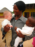 Here's Matimu's "grandmother" Rosemary Ngwenya (our host mother). She's got Matimu in one hand and her other youngest grandchild in her other hand! Transition to Madagascar - 103.jpg