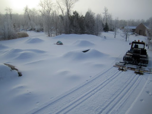 Grooming the start of JibFly near the dirt jump track