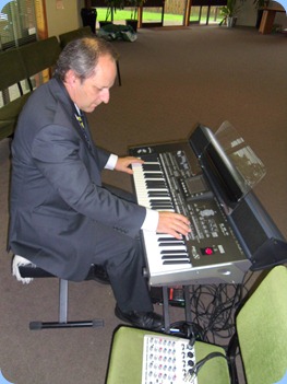 A rare moment! Doug Farr caught trying-out the new state-of-the-art Korg Pa3X. Doug was particularly interested in the piano sound and the organ sounds, Doug being a great theatre organ fan and collector!