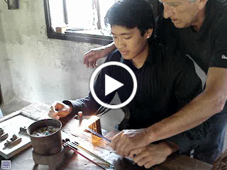 Video - Tai tries his hand at glass making - halfway through you can see him operating the bellows with his feet Video - Tai tries his hand at glass making - halfway through you can see him operating the bellows with his feet