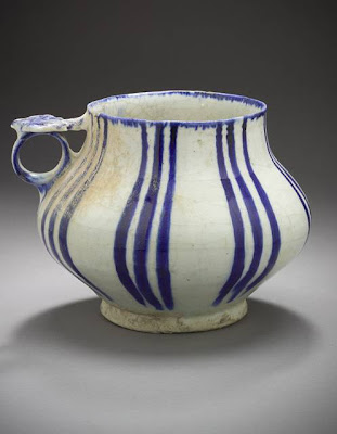 Tankard Iran Tankard, 12th or 13th century Ceramic; Vessel, Fritware, underglaze painted, 7 1/8 x 5 in. (18.10 x 12.70 cm) The Nasli M. Heeramaneck Collection, gift of Joan Palevsky (M.73.5.270) Art of the Middle East: Islamic Department.