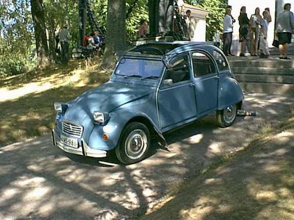 Old car in the shade