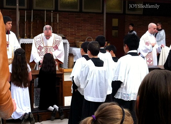 E receiving blessed candle 2.2.13