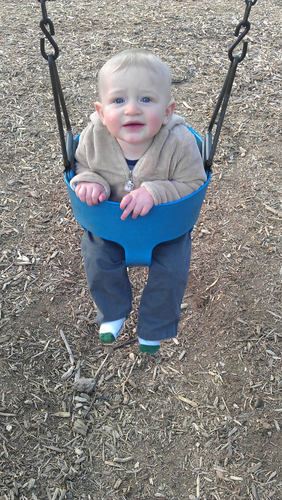 Charlie's fist time in the swing