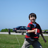 Kai flying his kite at Brenton Point in Newport