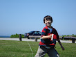 Kai flying his kite at Brenton Point in Newport