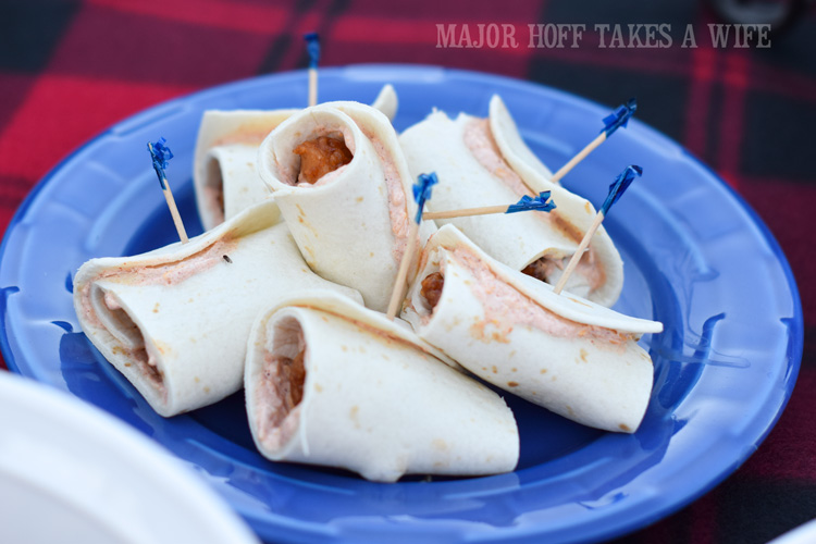Hot wing tortilla roll ups. Need a quick recipe for your next tailgate? Look no further than already prepared Deli Hot wings by Tyson. Make quick hot wing tortilla roll ups if you are in a hurry, or take the time to make Tex Mex Hot Wing Enchiladas. Great for a last minute dinner too! #GameTimeHero #CollectiveBias #recipe #ad Hot wing tortilla roll ups