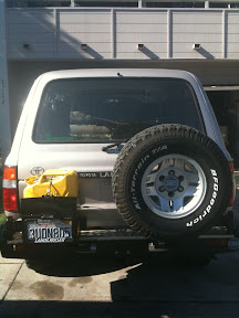 Finished product complete with 31" BFG All-Terrain and a diesel yellow NATO Jerry can