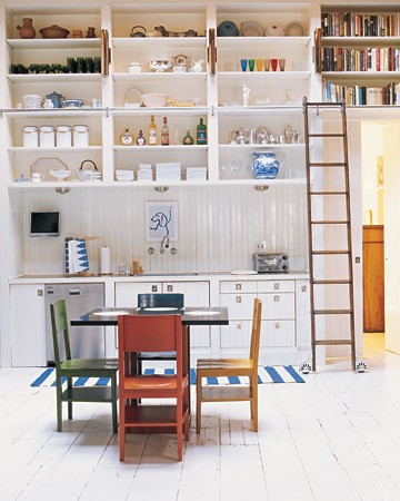 This fun and bright kitchen is actually our Decorating Editor Rebecca's house. We love her inventive use of the rolling ladder. No more standing on counters to reach for tableware. (September 2008) This fun and bright kitchen is actually our Decorating Editor Rebecca's house. We love her inventive use of the rolling ladder. No more standing on counters to reach for tableware. (September 2008)