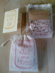 These stamped muslin-bag favors were filled with herbed pink salt.