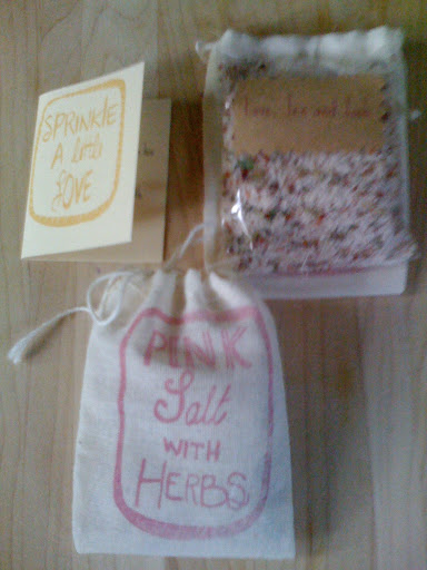 These stamped muslin-bag favors were filled with herbed pink salt.