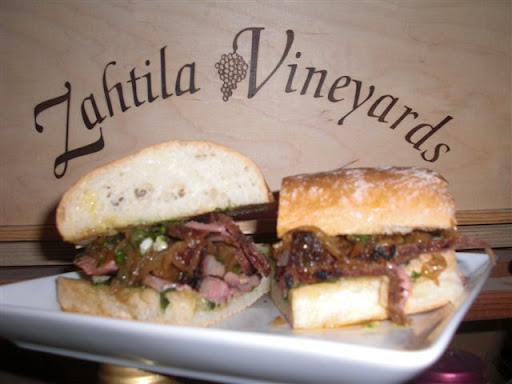 Tri tip, caramelized onions, and green salsa on pugliese bread-now that's a tasty sandwich Tri tip, caramelized onions, and green salsa on pugliese bread-now that's a tasty sandwich
