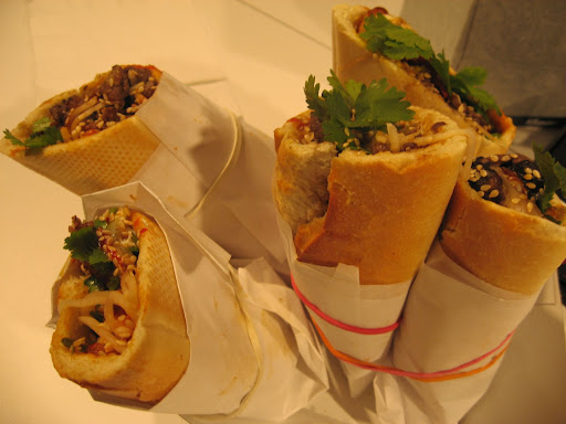 From Baogette, we tasted a Korean-inflected banh mi sandwich that featured beef, kim chi, cilantro, sesame seeds, cucumber, and plenty of spicy and savory sauces on a crusty baguette.