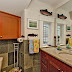 The main level includes a powder room.